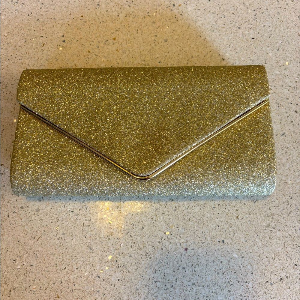 Elegant Gold Clutch Bag with chain strap, NWOT